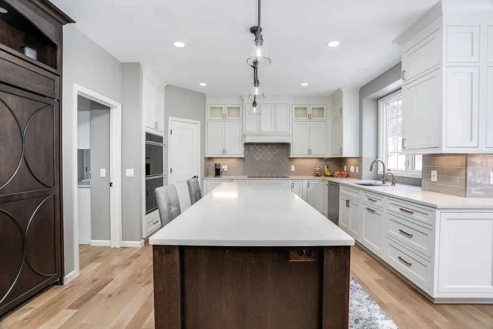 Kitchen remodel with island in Brighton, MI by Lux Builders