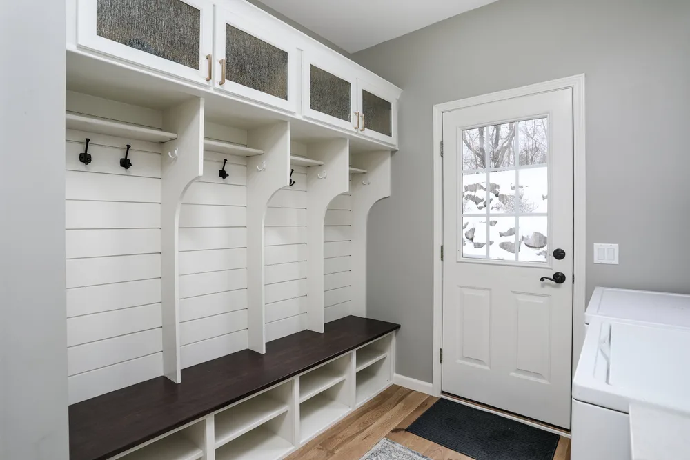 Mudroom lockers and bench in Brighton, MI by Lux Builders