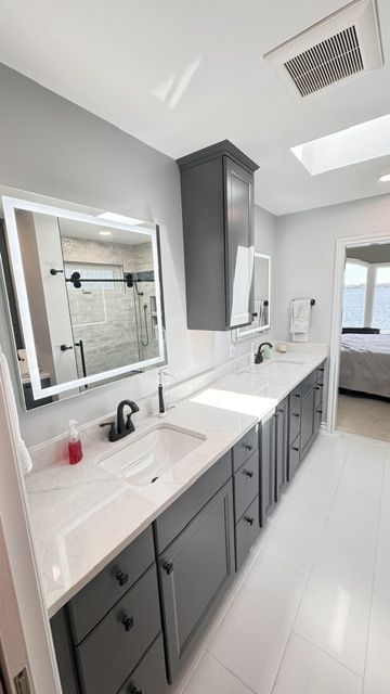 After — Lake house primary bath remodel